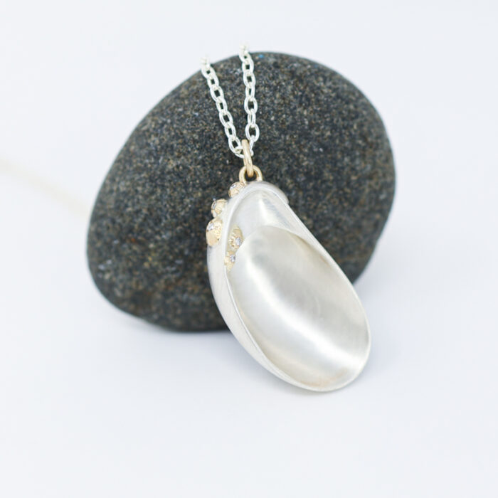 slipper shell ruthie b necklace with barnacles and diamonds by hannah blount