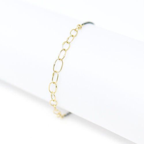handmade links bracelet in mixed metal yellow gold and oxidized sterling silver by Sarah McGuire